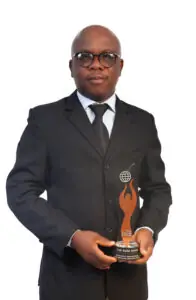 Ing. Ebenezer Kwadjo Dankyi holding an award