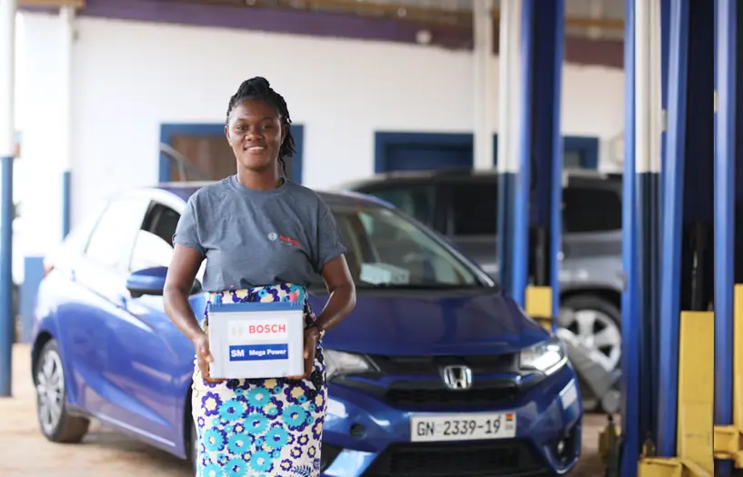 AETS staff member with a boxed Bosch part